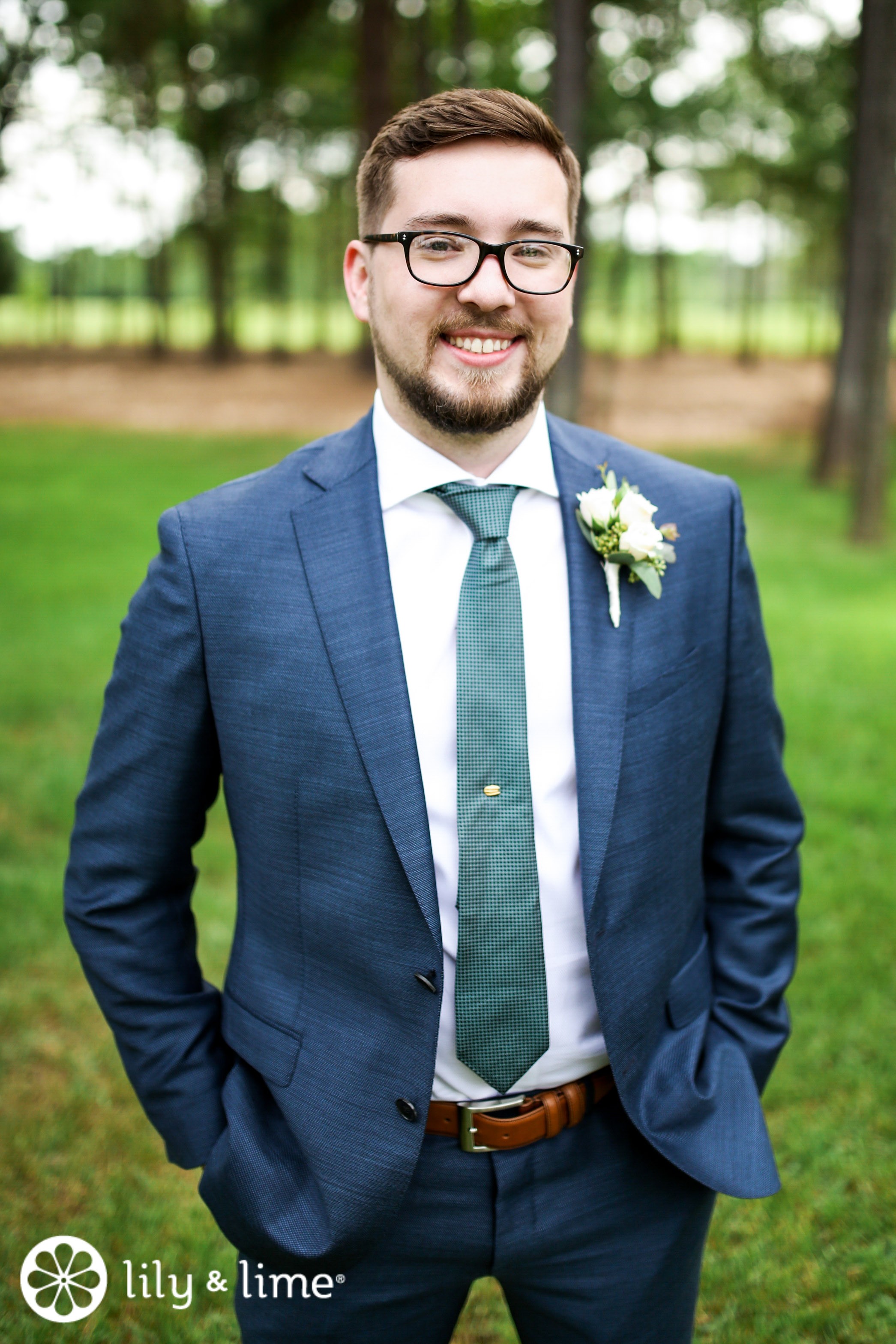 Blue suit green tie wedding sales