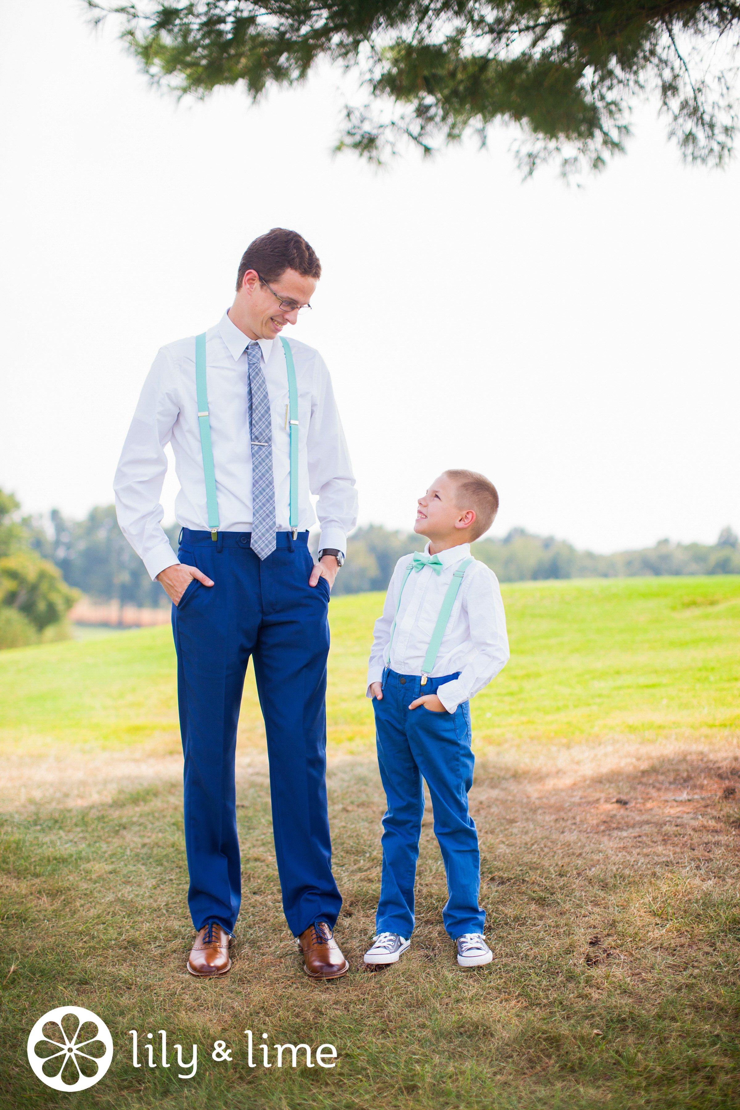 groom and ring bearer candid wedding photo