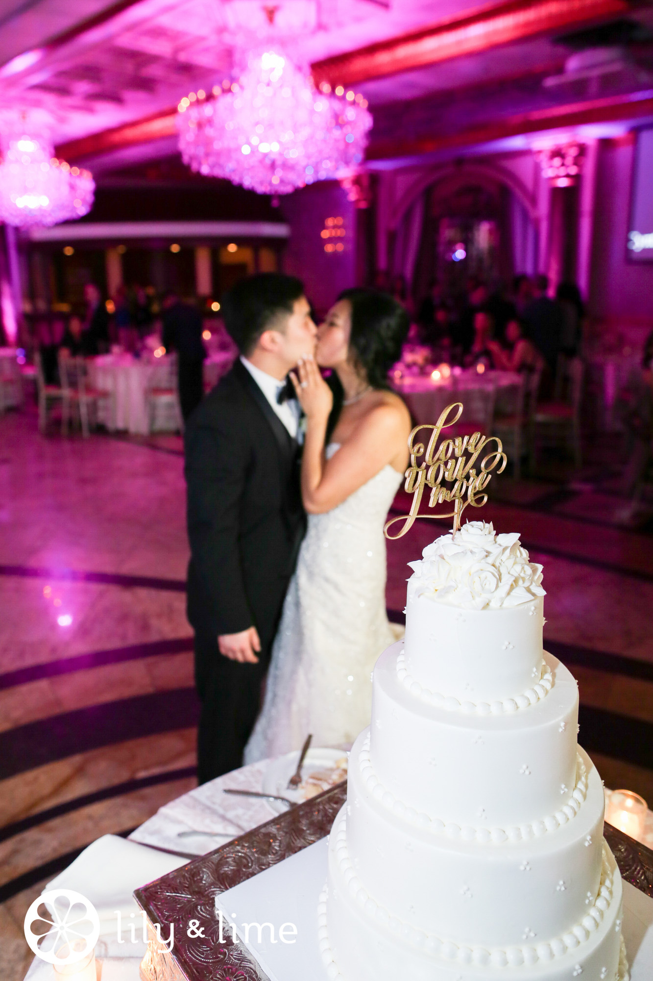 purple uplighting indoor wedding ceremony