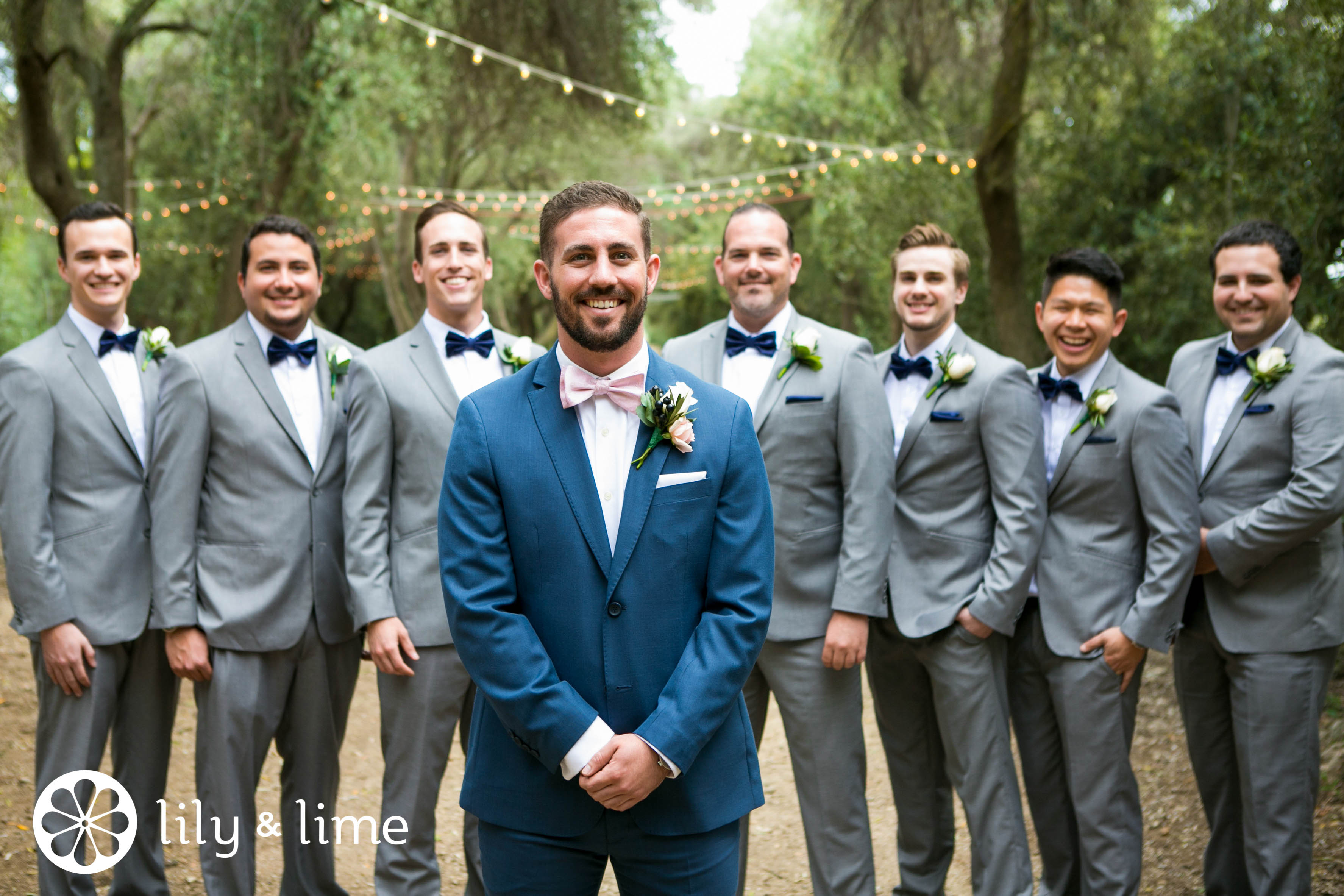groom blue wedding suit pink bowtie