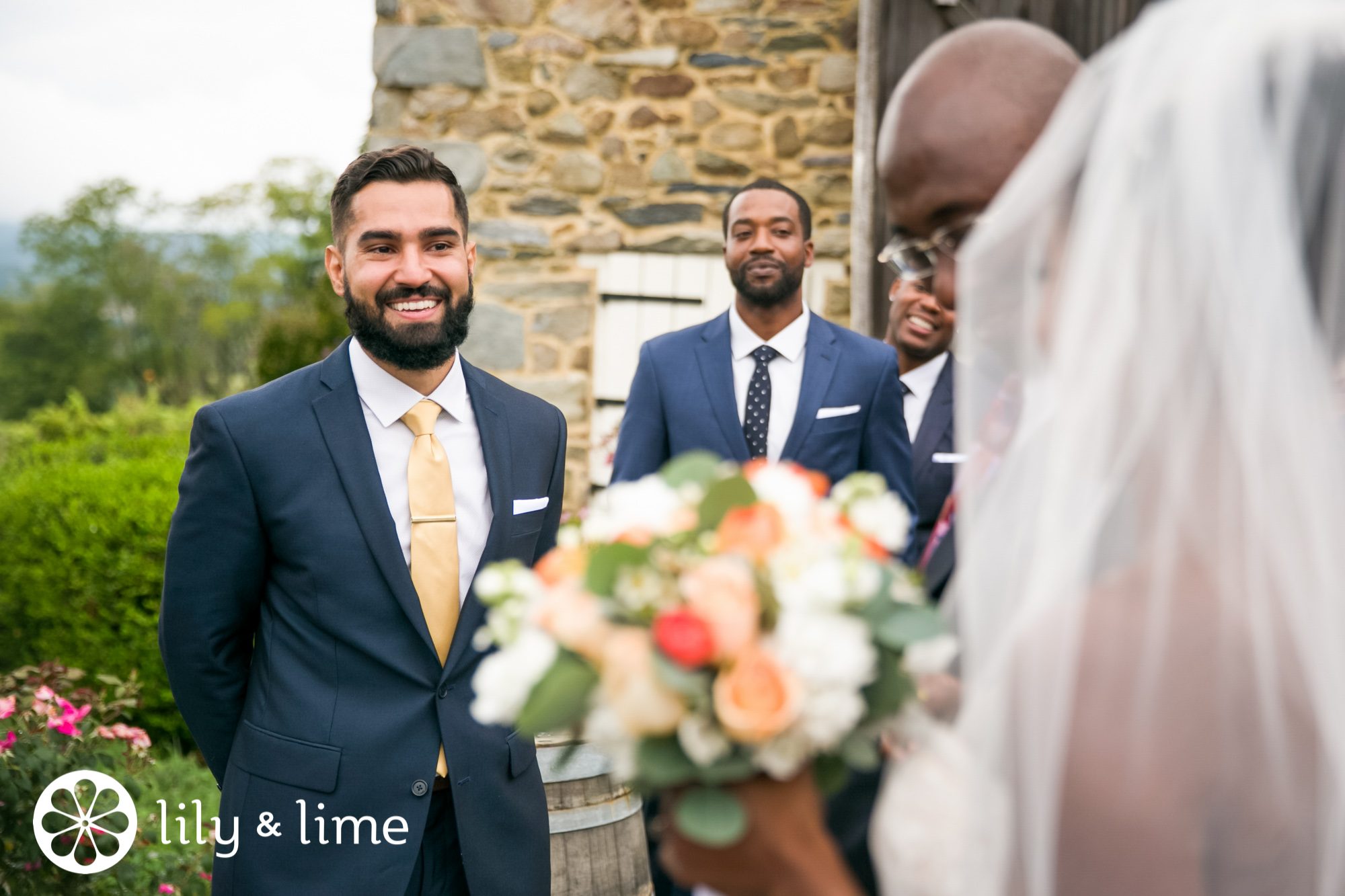 bride and groom ceremony first look