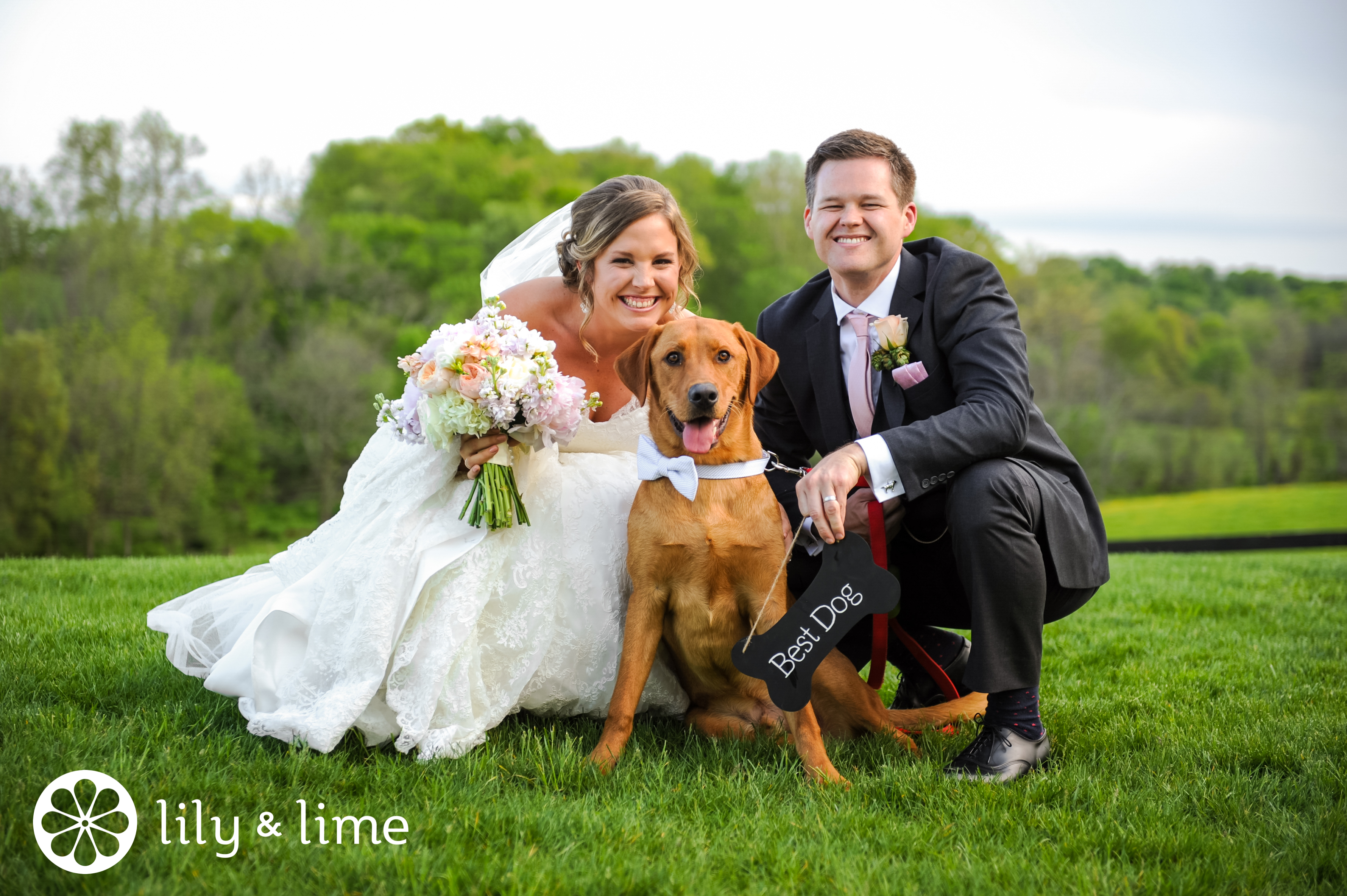 bride and groom with cute dog