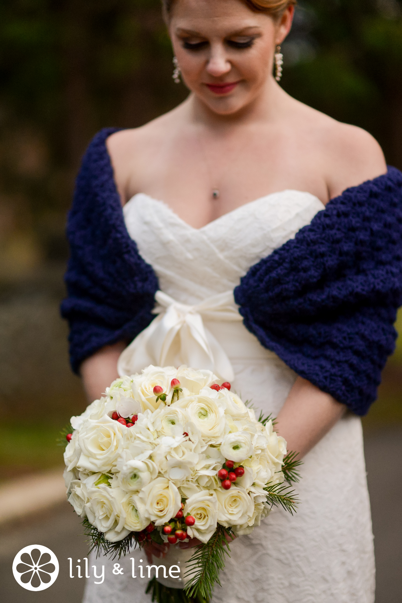 winter wrap and wedding bouquet