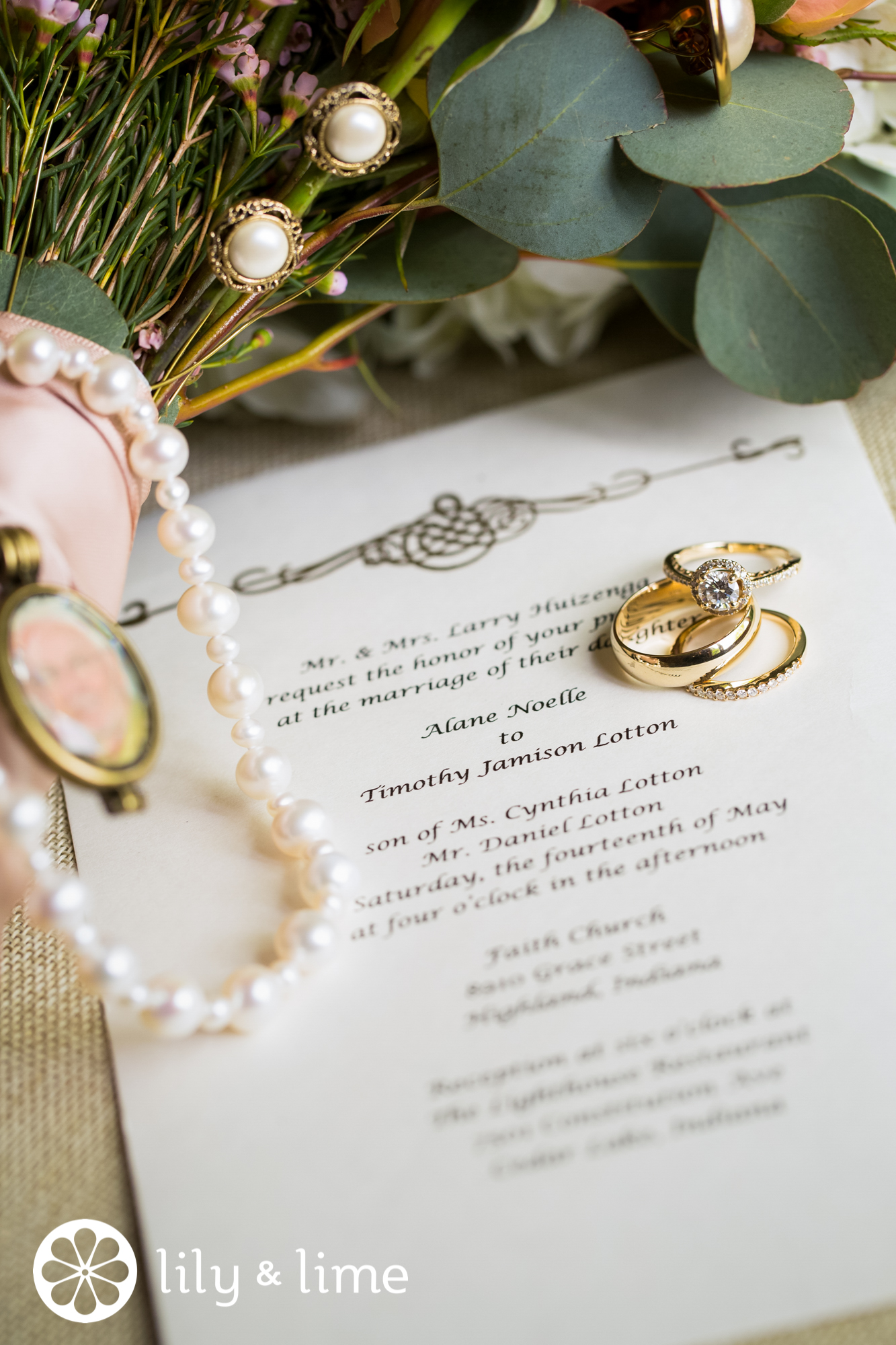 wedding rings and wedding invitation