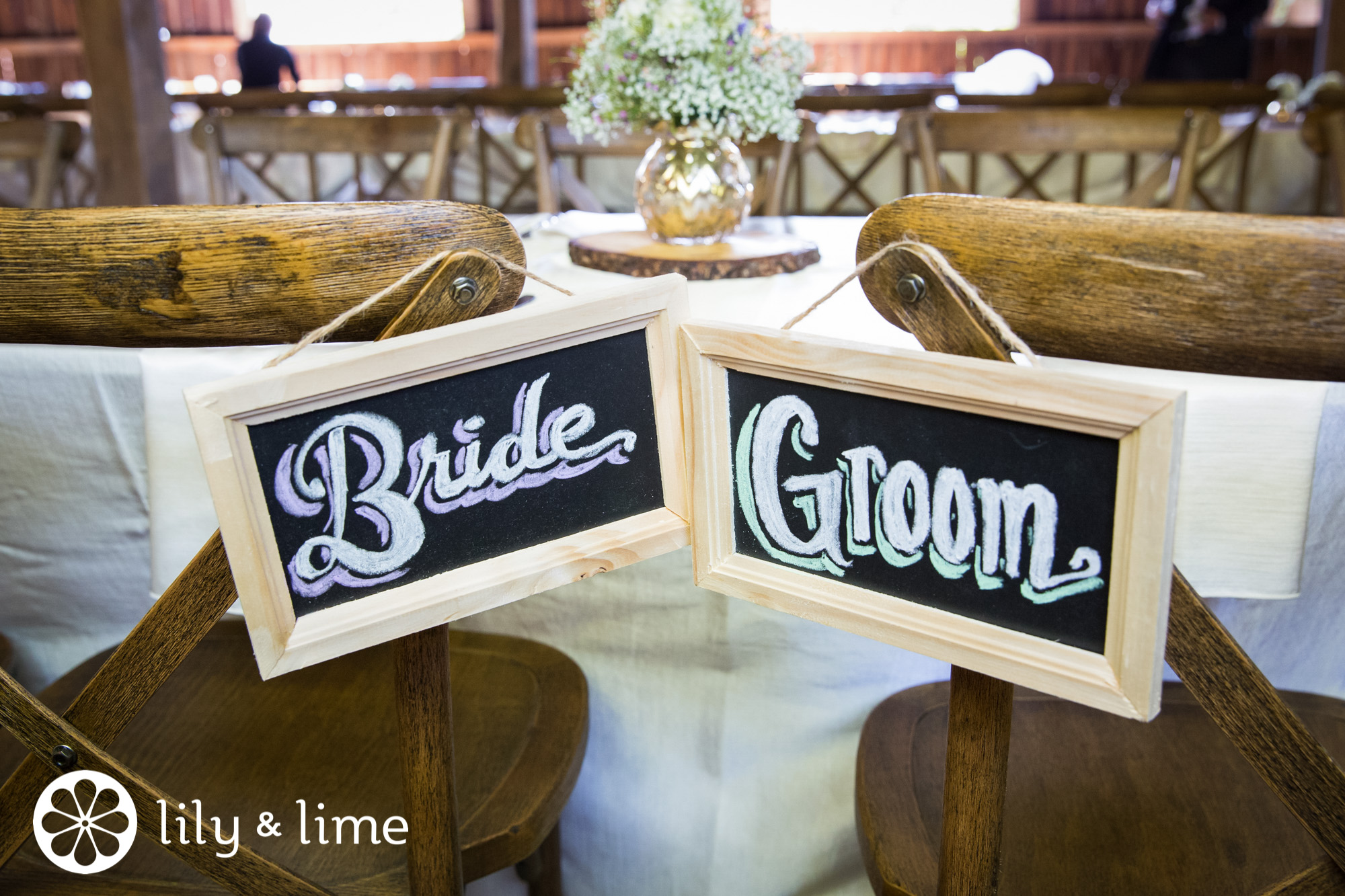 chalkboard bride and groom sign