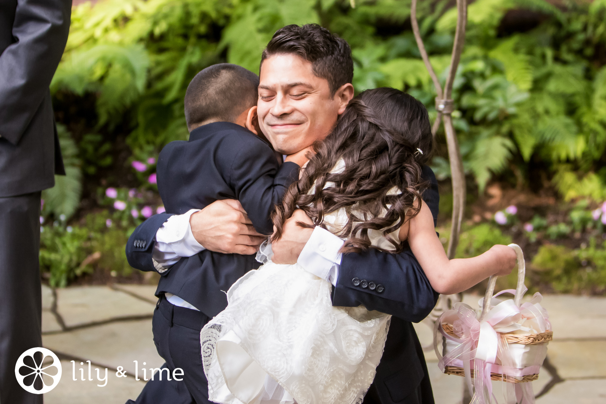 candid groom and kids wedding moment